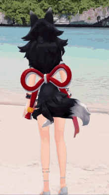 a cartoon character standing on a beach with a red bow on her tail
