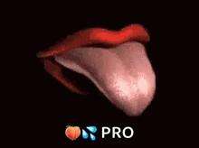 a close up of a woman 's mouth with her tongue out