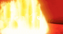 a close up of a fire on a red and orange background