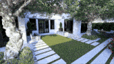 an artist 's impression of a backyard with a lawn and trees