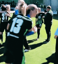 a soccer player with the number 13 on the back of their jersey