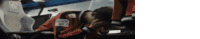 a man in a racing suit has a sticker on his jacket that says ' abarth '