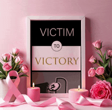 a framed poster that says victim to victory surrounded by pink flowers