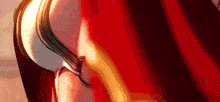 a close up of a red curtain with a few lines on it