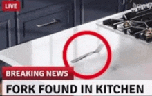 a fork is found in a kitchen on a live breaking news report