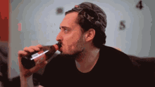 Taking A Drink Thristy GIF - Taking A Drink Thristy Looking Over GIFs