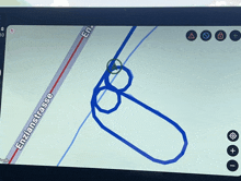 a phone screen shows a map with the words erzianstrasse