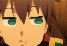 a close up of a person 's face with a slight smirk on their face