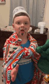 a young boy with a shirt that says truth never cries