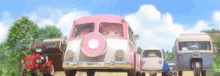 a group of cartoon cars are driving down a road with trees in the background .