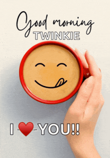 a person holding a cup of coffee with a smiley face on it and the words good morning twinkie i love you