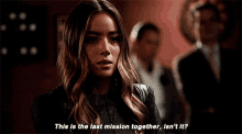 a woman in a black jacket says this is the last mission together isn 't it .