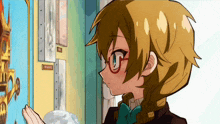 a girl with glasses is looking at a painting