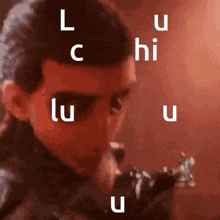 a close up of a person 's face with the letters l c hi lu u written on it