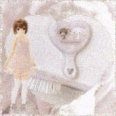 a girl in a pink dress is standing next to a heart shaped object