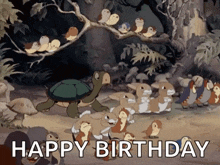a cartoon of a turtle surrounded by rabbits and birds with the words happy birthday below it