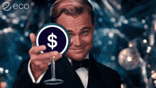a man in a tuxedo is holding up a glass with a dollar sign on it