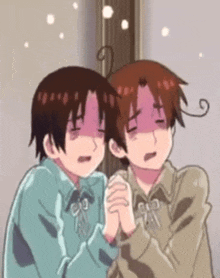 two anime characters are hugging each other and one is covering his face with his hand