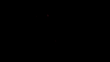 the word zero is lit up in red on a dark background