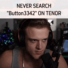 a man wearing headphones stands in front of a microphone with the caption " never search "