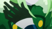 a close up of a person 's hand with green hair