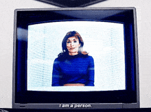 a television screen says i am a person on the bottom