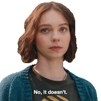 a woman wearing a blue cardigan and a black shirt says no it doesn 't