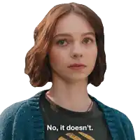 a woman wearing a blue cardigan and a black shirt says no it doesn 't