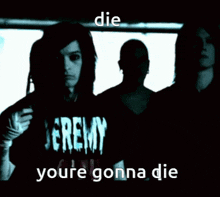 a man is holding a knife and wearing a black shirt that says " die "