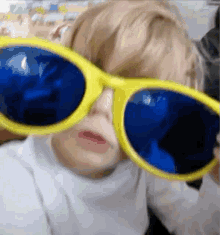 Sunglasses Looking GIF - Sunglasses Looking Kid GIFs