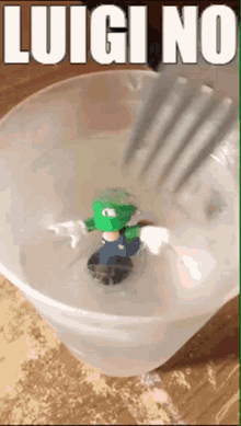 a picture of luigi in a cup with the words luigi no on it