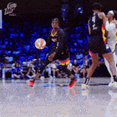 a basketball player for the phoenix suns dribbles a ball