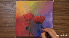a colorful painting of flowers is made by animatica