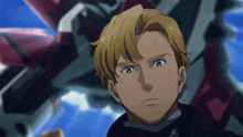 a man with blonde hair and blue eyes is standing in front of a pink and white robot