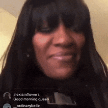 a close up of a woman 's face with the words good morning queen on the bottom