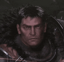 a close up of a man 's face with a fur collar around his neck