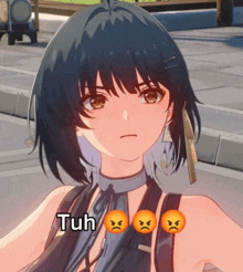 a close up of a girl with three angry faces and the word tuh on her chest