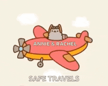 a cartoon cat is flying a plane with annie and rachel written on it .