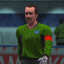 a man with a mustache wearing a green jersey with a patch that says fcb on it