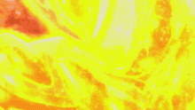 a close up of a bright orange and yellow fire