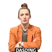 a woman with her arms crossed has the word dasding on her shirt