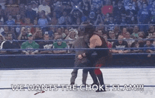 a wrestling match is taking place in a ring with a crowd watching and the words `` we wants the choke slam ! ''