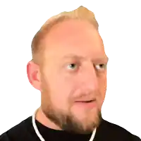 a man with a beard wearing a black shirt