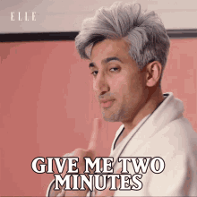 Give Me Two Minutes Tan France GIF