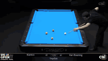 a pool table with a blue cloth that says diamond