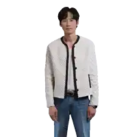a man wearing a white jacket and blue jeans stands in front of a white background