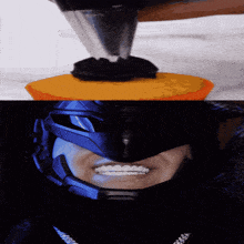 a close up of a person 's face with a helmet on