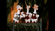 three cartoon ducks standing next to each other on a wooden fence