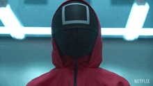 a person wearing a red jacket and a black mask with a netflix logo on the bottom right