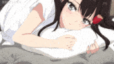 a girl with a flower in her hair is laying on a bed with ndb sama written on the bottom